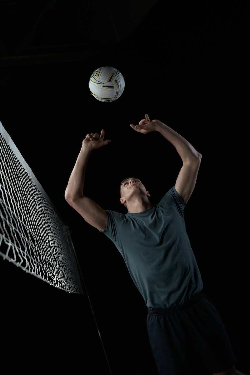 Low Angle Shot of a Man Playing Volleyball